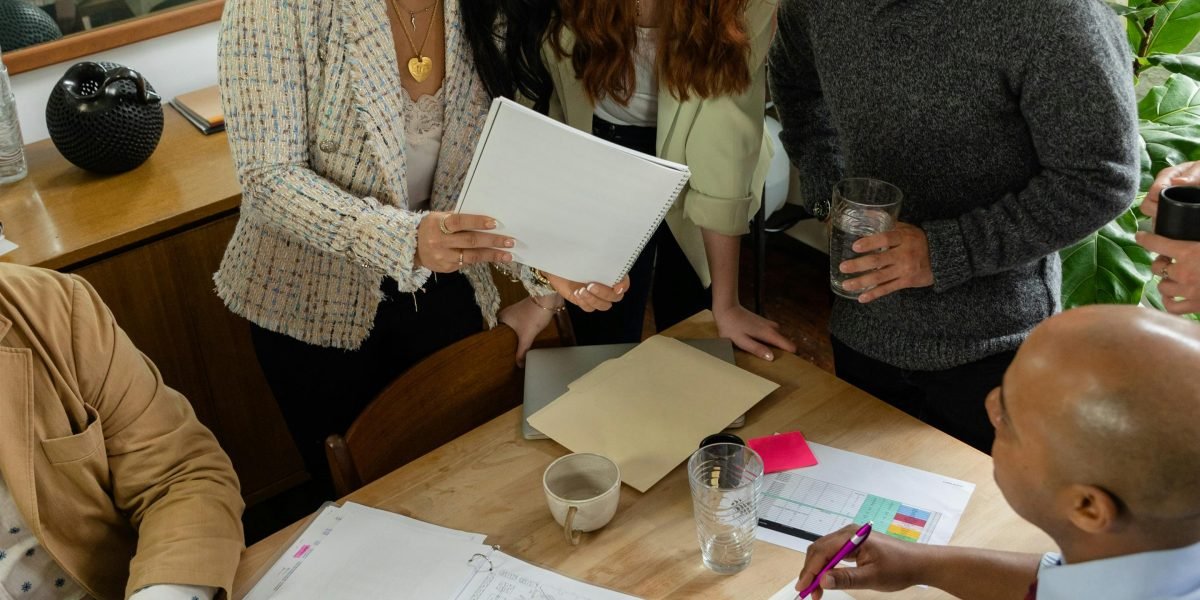 A diverse group of individuals engaging in a community-based mental health workshop or support group.