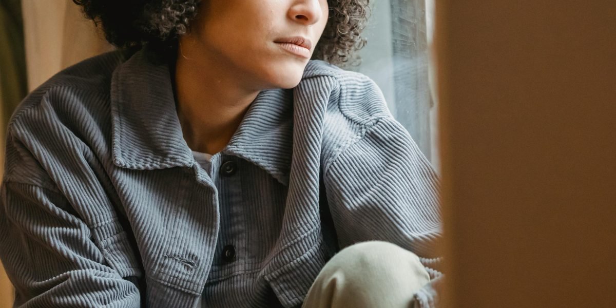 An individual experiencing a sense of isolation or lack of social support.