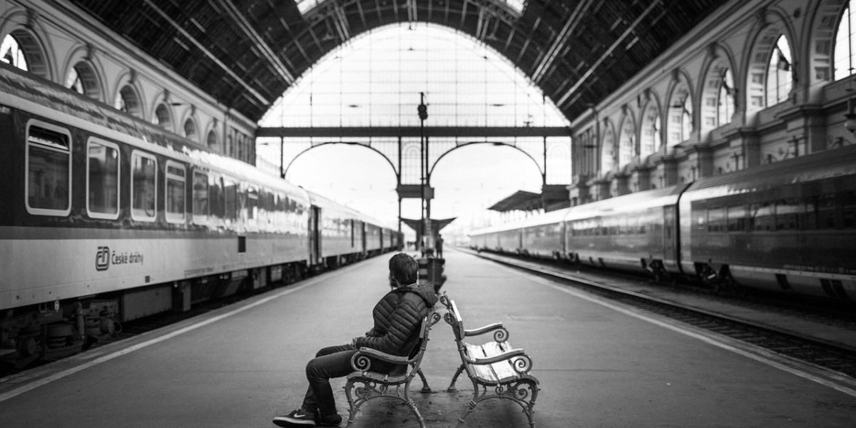A person experiences feelings of discomfort or paranoia in an everyday setting.