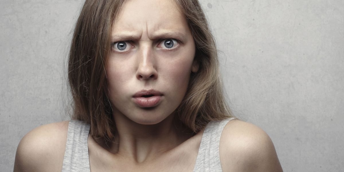 A person appearing thoughtful and slightly confused, reflecting the initial difficulty in understanding complex mental health information.