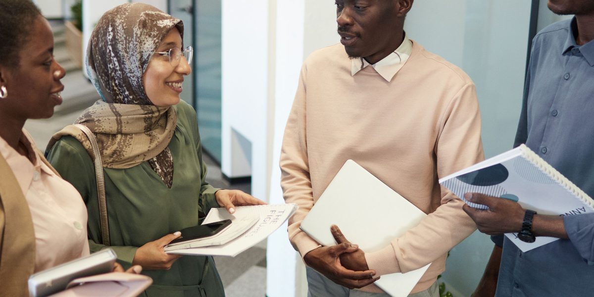 Two individuals engaging in a focused and clear conversation, illustrating the impact of precise language.