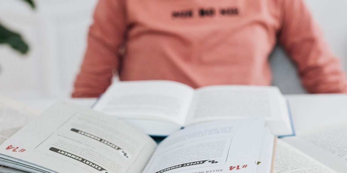 A person actively engaged in learning, symbolizing the educational value of well-used analogies.