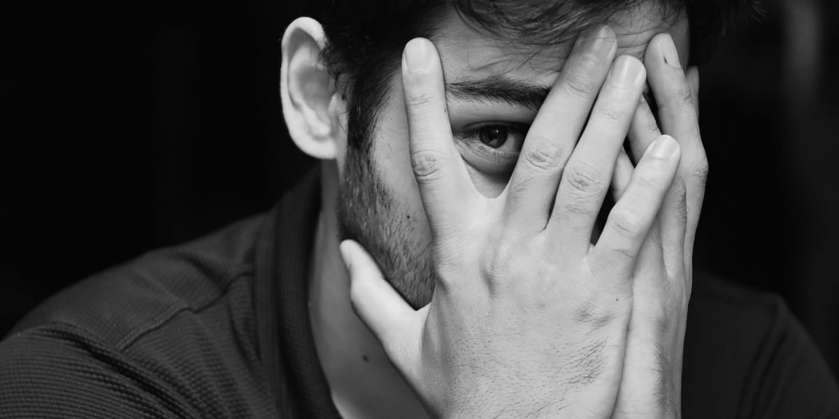 A person looking thoughtful and at peace, suggesting a moment of clarity or understanding.